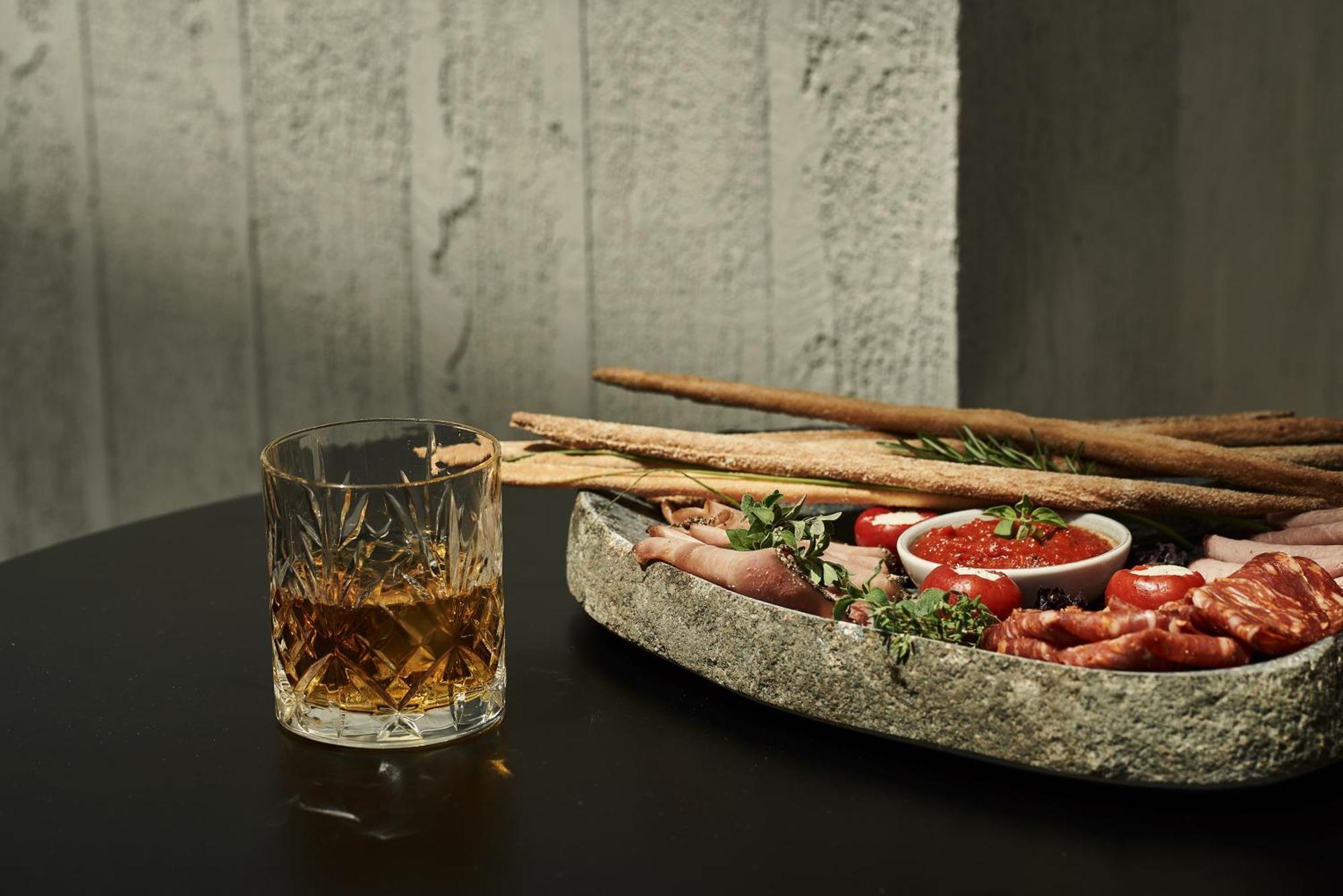 Hotel The Newel Psychiko Atene Esterno foto A glass of grappa